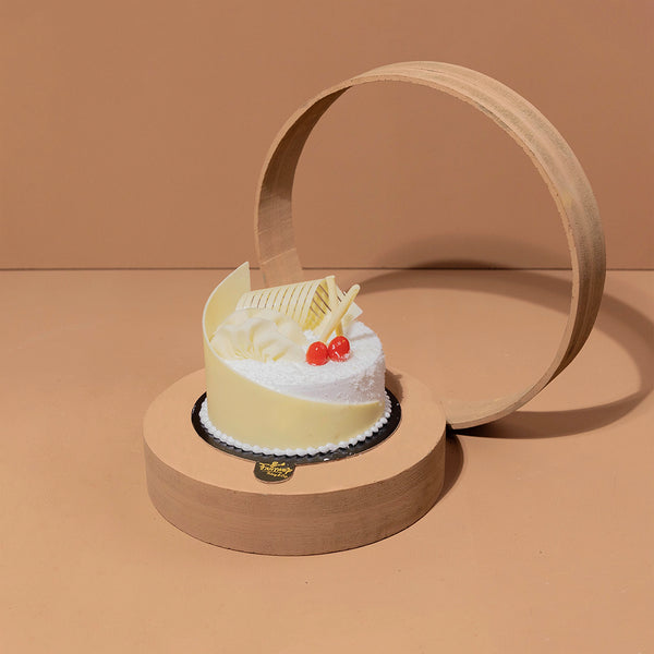 Malai Coconut Truffle Cake